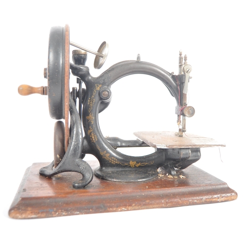 430 - A late 19th century American Willcox and Gibbs of New York hand sewing machine. C-frame hand-cranked... 