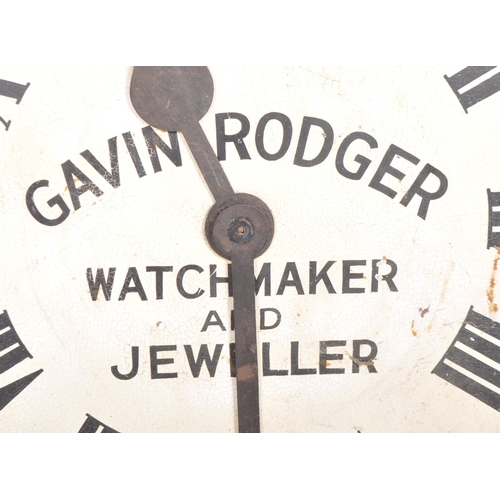 441 - A large early 20th Century shop size advertising point of sale wall clock for Gavin Rodgers Watchmak... 