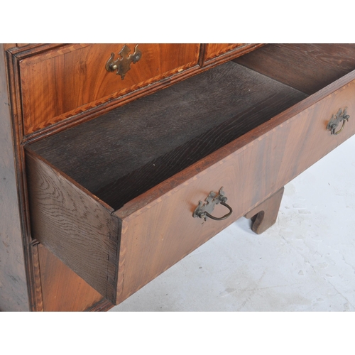 443 - A 20th Century Queen Anne style double dome walnut bureau bookcase having a twin arched top bookcase... 