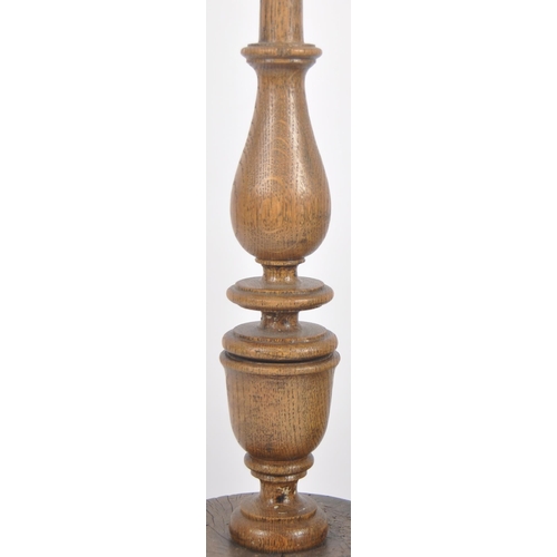 444 - A early 20th century ecclesiastical barley twist candlestick. Of large proportions, on a barley twis... 