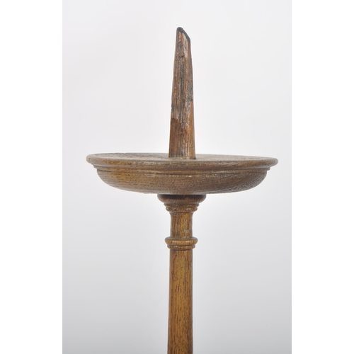 444 - A early 20th century ecclesiastical barley twist candlestick. Of large proportions, on a barley twis... 