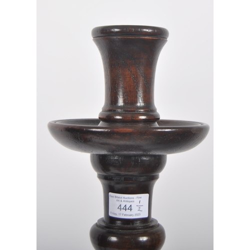 444 - A early 20th century ecclesiastical barley twist candlestick. Of large proportions, on a barley twis... 