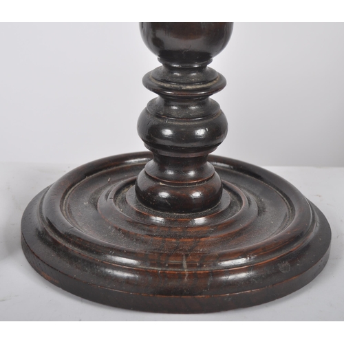 444 - A early 20th century ecclesiastical barley twist candlestick. Of large proportions, on a barley twis... 