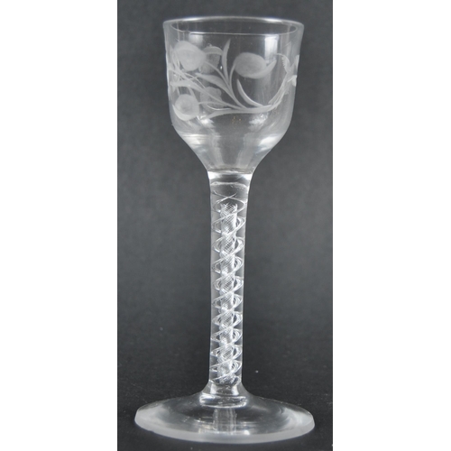 45 - An 18th Century engraved double series air twist wine glass of possible Jacobite significance. Ogee ... 