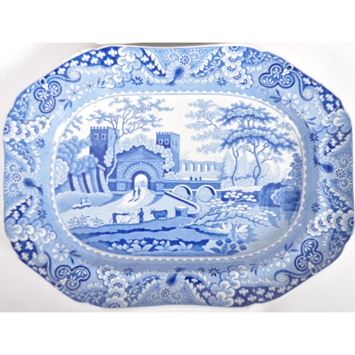 453 - A pair of 19th Century blue & white meat platter trays. Transfer printed decoration depicting castle... 