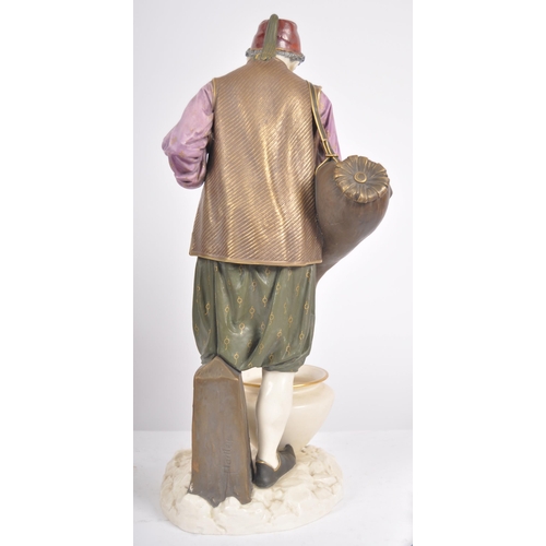 462 - A 19th Century Hadley's Worcester large porcelain figurine depicting a male water carrier. The figur... 