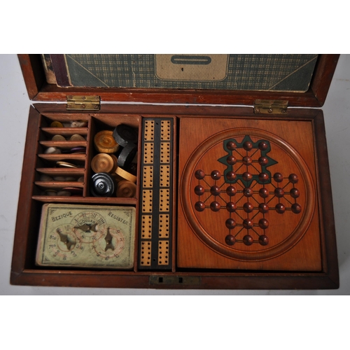 463 - A 19th Century Victorian mahogany cased games compendium box in the manner of Jacques of London. Ins... 