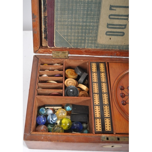 463 - A 19th Century Victorian mahogany cased games compendium box in the manner of Jacques of London. Ins... 