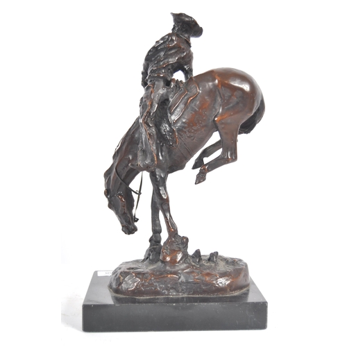 468 - After Frederic Remington, Mountain Man, patinated bronze, depicting an outlaw on rearing horse. Sign... 