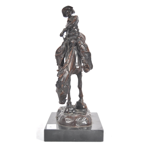 468 - After Frederic Remington, Mountain Man, patinated bronze, depicting an outlaw on rearing horse. Sign... 