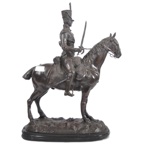 473 - A 19th Century large bronze figurine depicting a Napoleonic officer mounted on horseback. The large ... 