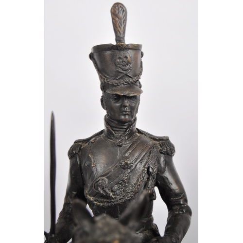 473 - A 19th Century large bronze figurine depicting a Napoleonic officer mounted on horseback. The large ... 