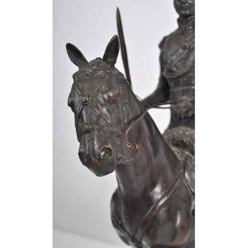 473 - A 19th Century large bronze figurine depicting a Napoleonic officer mounted on horseback. The large ... 