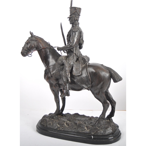 473 - A 19th Century large bronze figurine depicting a Napoleonic officer mounted on horseback. The large ... 