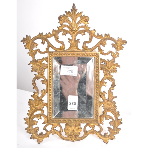 476 - A 19th Century French ormolu bronze dressing table mirror with central bevelled glass mirror plate s... 