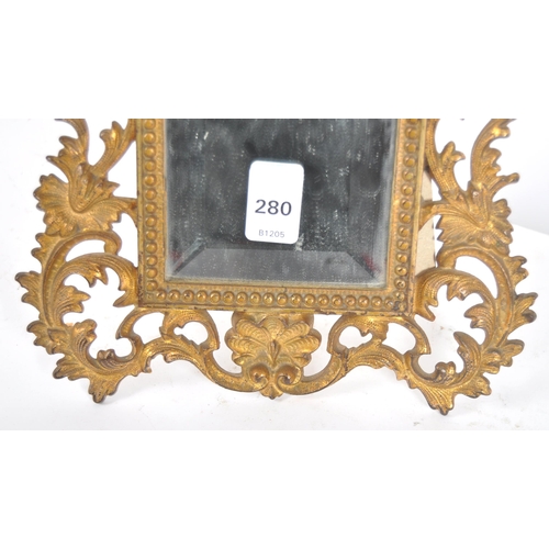 476 - A 19th Century French ormolu bronze dressing table mirror with central bevelled glass mirror plate s... 