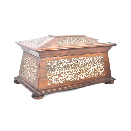 478 - A 19th Century Victorian rosewood and mother of pearl inlay tea caddy of sarcophagus form. Intricate... 