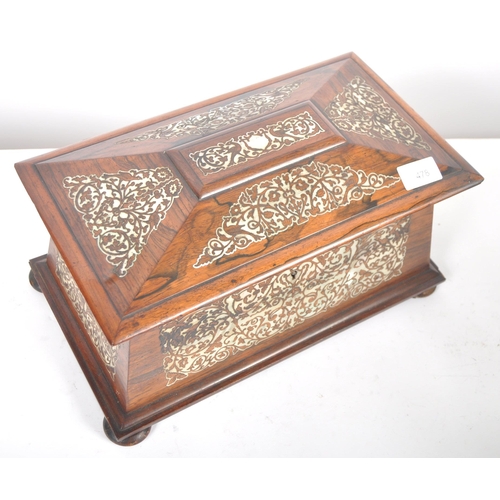 478 - A 19th Century Victorian rosewood and mother of pearl inlay tea caddy of sarcophagus form. Intricate... 