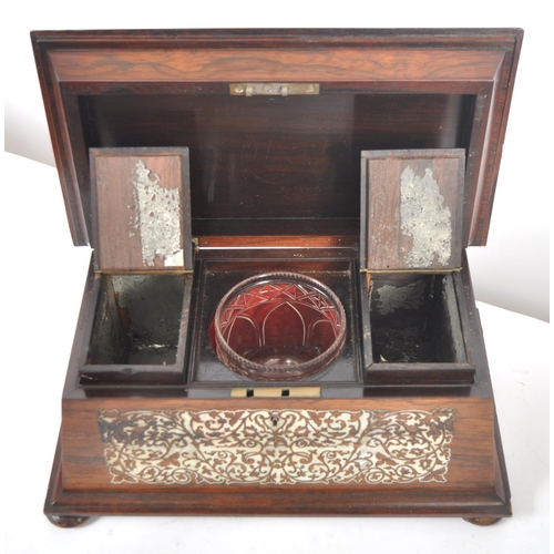 478 - A 19th Century Victorian rosewood and mother of pearl inlay tea caddy of sarcophagus form. Intricate... 