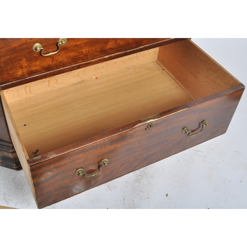 48 - A large 19th Century Victorian mahogany cupboard on chest having a double door cupboard top supporte... 