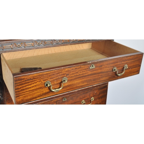 48 - A large 19th Century Victorian mahogany cupboard on chest having a double door cupboard top supporte... 