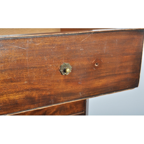 48 - A large 19th Century Victorian mahogany cupboard on chest having a double door cupboard top supporte... 