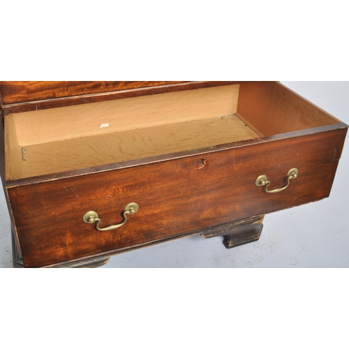 48 - A large 19th Century Victorian mahogany cupboard on chest having a double door cupboard top supporte... 