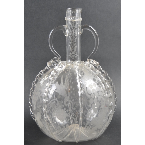 482 - A set of three 19th Century Dutch hand blown glass decanters. Each of bulbous bottle form with appli... 