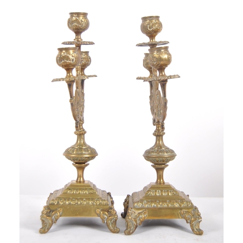 484 - A pair of 19th Century gilt brass candelabra centrepiece garnitures. Each with triple candlestick sc... 