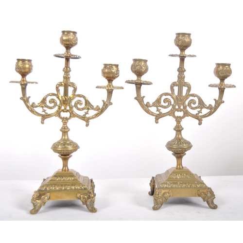 484 - A pair of 19th Century gilt brass candelabra centrepiece garnitures. Each with triple candlestick sc... 