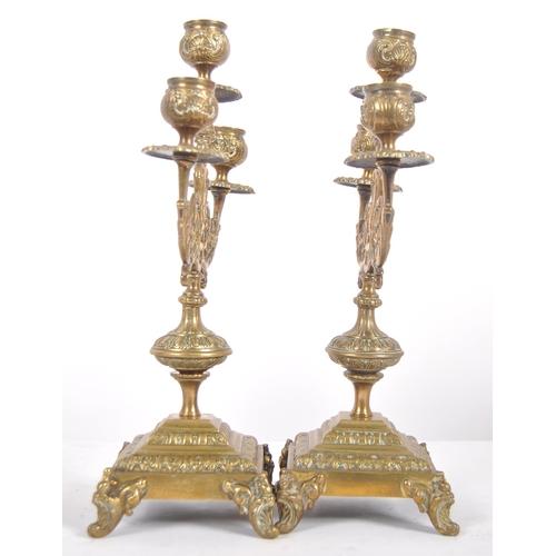 484 - A pair of 19th Century gilt brass candelabra centrepiece garnitures. Each with triple candlestick sc... 