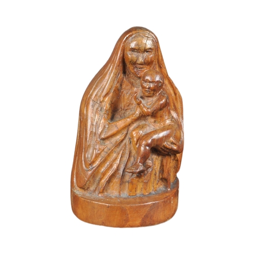 485 - A 20th century walnut carving of Mary & the Child Christ.  Figured posed seated, shawl draped and ho... 