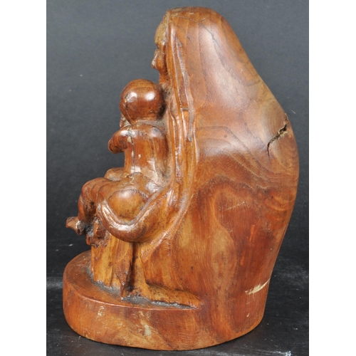 485 - A 20th century walnut carving of Mary & the Child Christ.  Figured posed seated, shawl draped and ho... 