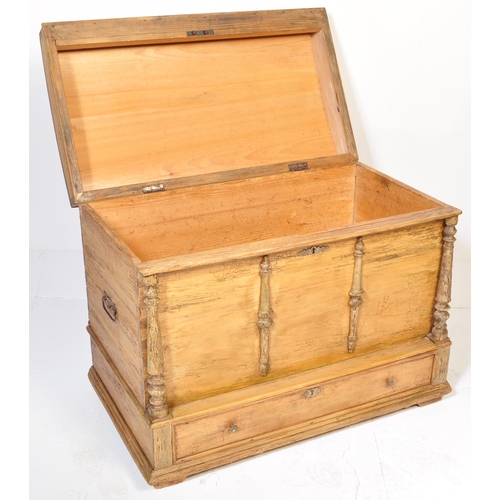 49 - A 19th Century pine blanket box chest steamer trunk. Domed top with carved columns to the front. The... 