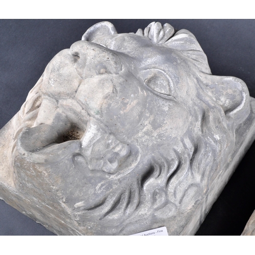 491 - Two early 20th Century composite stone lion mask wall plaques. Each with high relief lion face mask ... 