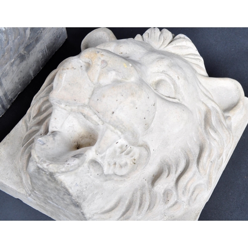 491 - Two early 20th Century composite stone lion mask wall plaques. Each with high relief lion face mask ... 