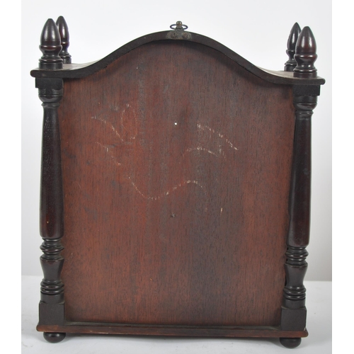 492 - A 19th Century mahogany wall collectors cabinet having a lift top glazed door with arched top set wi... 