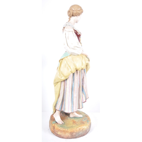 496 - A very large large 19th Century French Jean Gille bisque porcelain figure, of a lady in standing pos... 