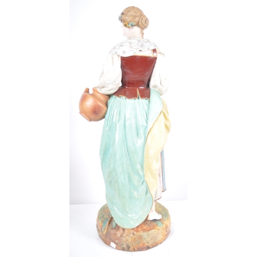 496 - A very large large 19th Century French Jean Gille bisque porcelain figure, of a lady in standing pos... 