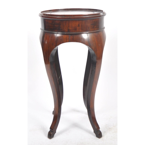 498 - An 18th Century continental French Empire mahogany torchere bust jardinière stand. Raised edge top w... 