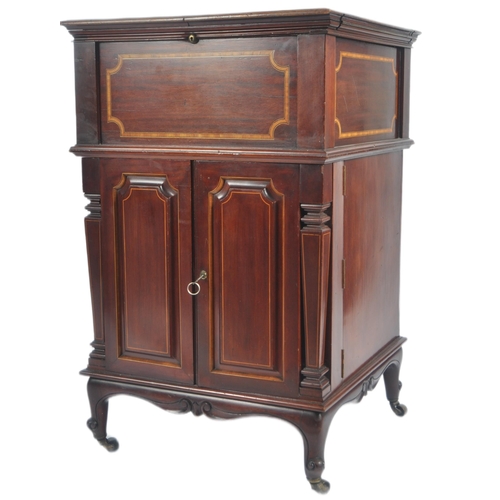 50 - An early 20th Century Edwardian mahogany inlaid drinks bar entitled The Eclipse. Twin folding doors ... 