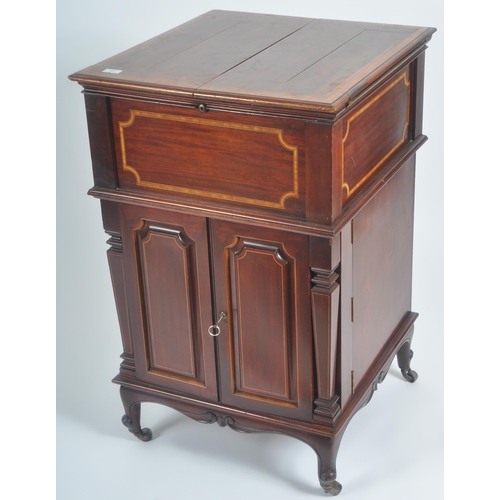 50 - An early 20th Century Edwardian mahogany inlaid drinks bar entitled The Eclipse. Twin folding doors ... 