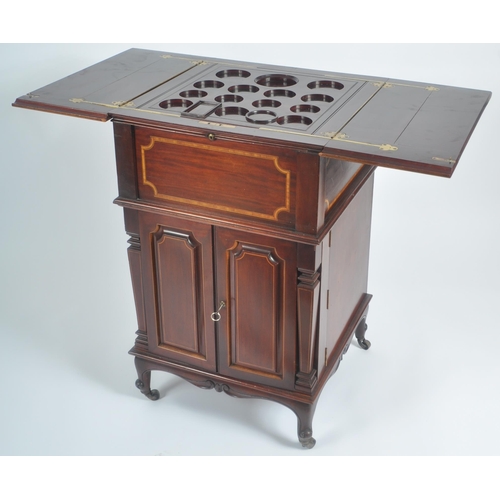 50 - An early 20th Century Edwardian mahogany inlaid drinks bar entitled The Eclipse. Twin folding doors ... 