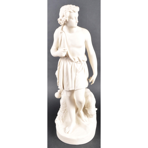 505 - A large 19th Century Parian ware classical figurine depicting a standing gentleman in toga raised on... 