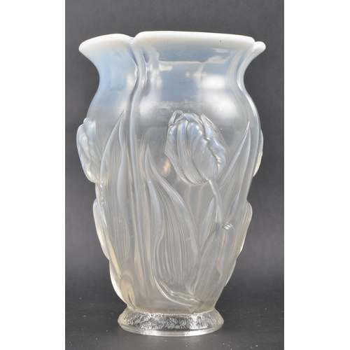 516 - An early 20th Century French Art Nouveau iridescent glass vase in the manner of Rene Lalique. Shaped... 