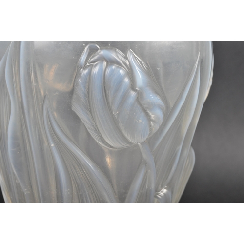 516 - An early 20th Century French Art Nouveau iridescent glass vase in the manner of Rene Lalique. Shaped... 