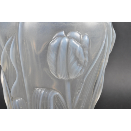 516 - An early 20th Century French Art Nouveau iridescent glass vase in the manner of Rene Lalique. Shaped... 