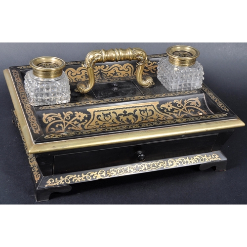 517 - A 19th Century Regency ebonised and Boulle work desk stand / tidy having a leaf work brass handle wi... 