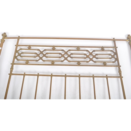 52 - A 19th Century Victorian double sized brass bed. Headboard and footboard present with cylindrical si... 