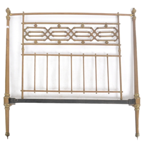 52 - A 19th Century Victorian double sized brass bed. Headboard and footboard present with cylindrical si... 